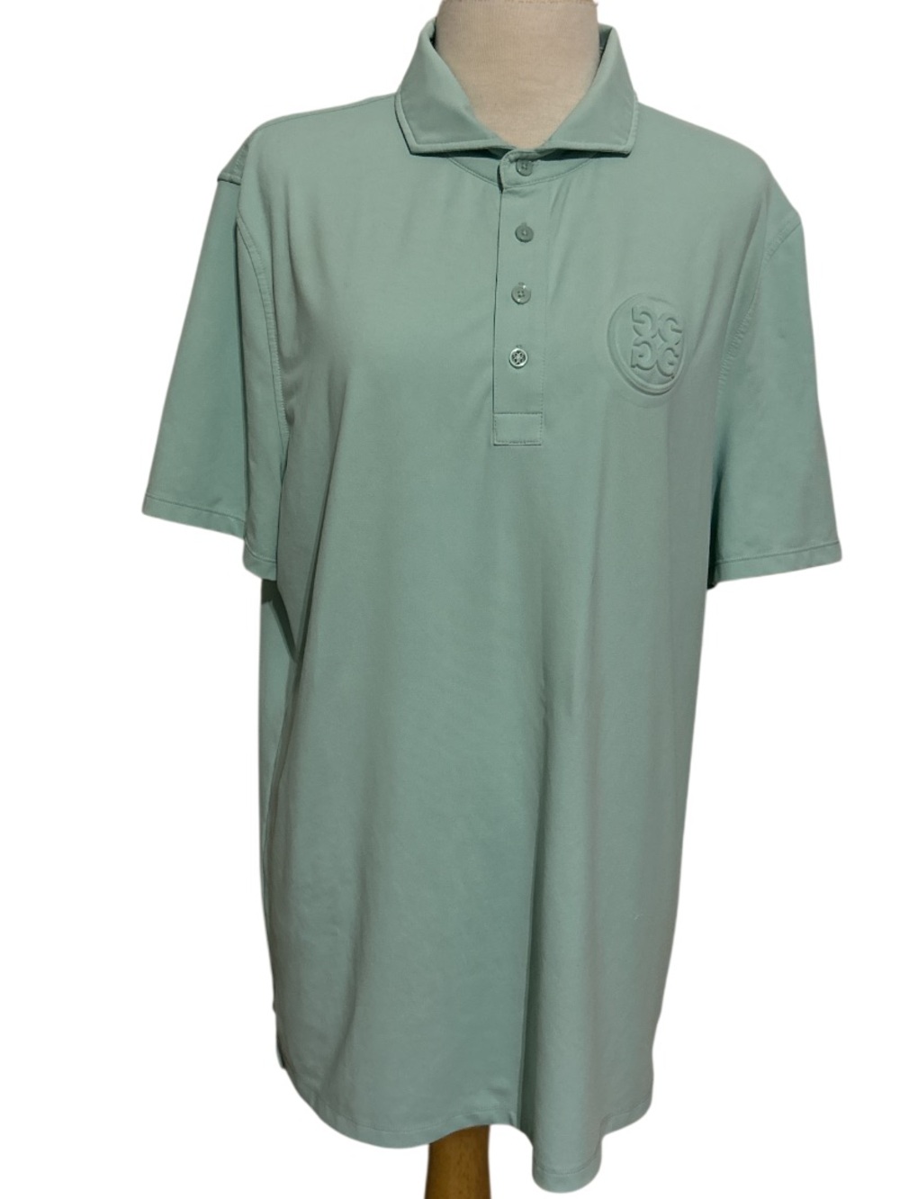 G/FORE Men's Circle G's
Embossed
Tech Jersey Banded Sleeve Polo.
Size Large